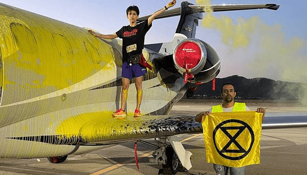 Jets & Yachts The Party’s Over: Activists glue themselves to a private jet in Ibiza